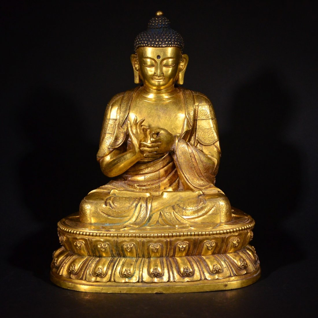 A GILD BRONZE FIGURE OF RULAI (1 of 10)