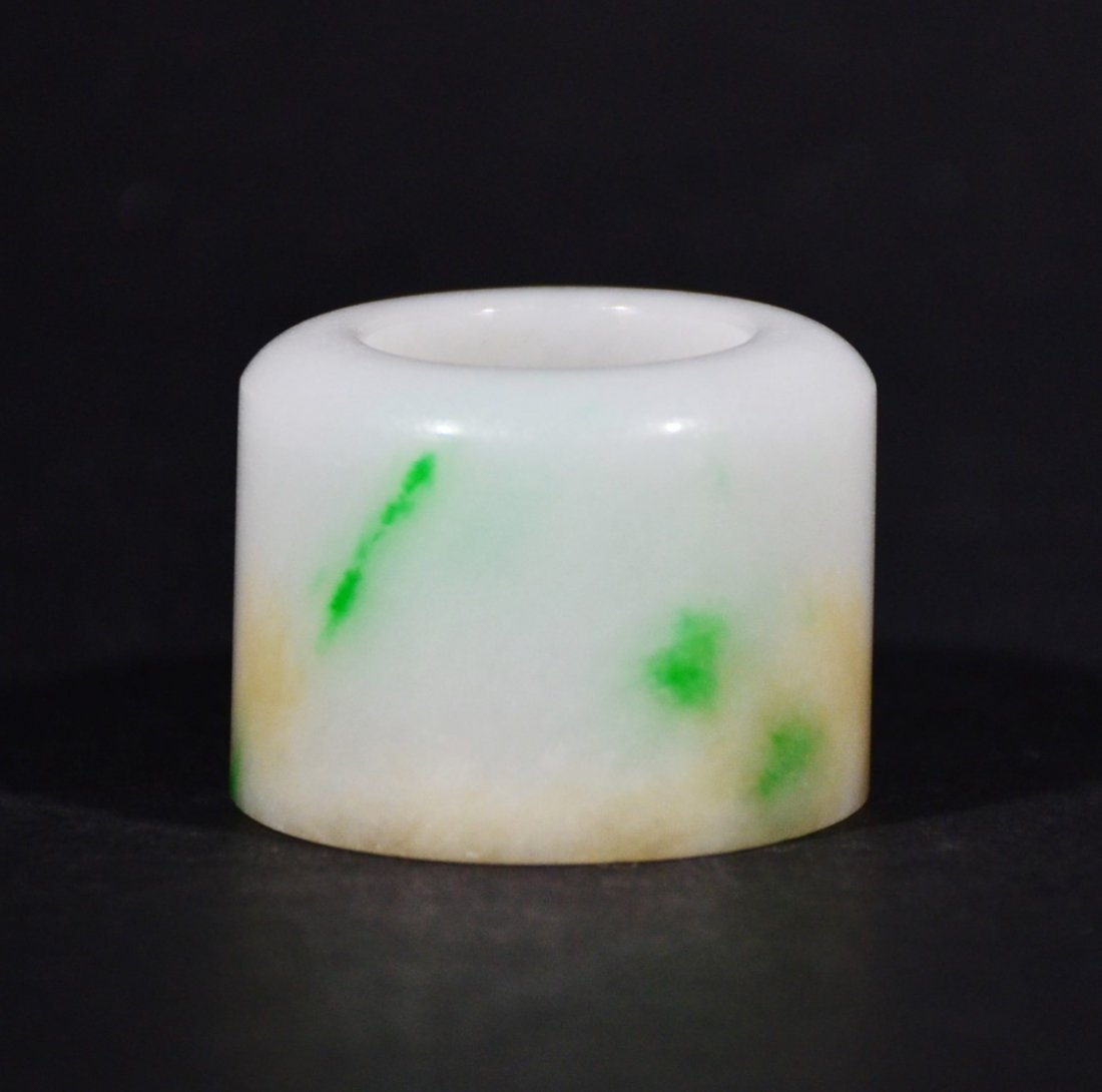 QING D. A GREEN JADE THUMB RING (1 of 4)