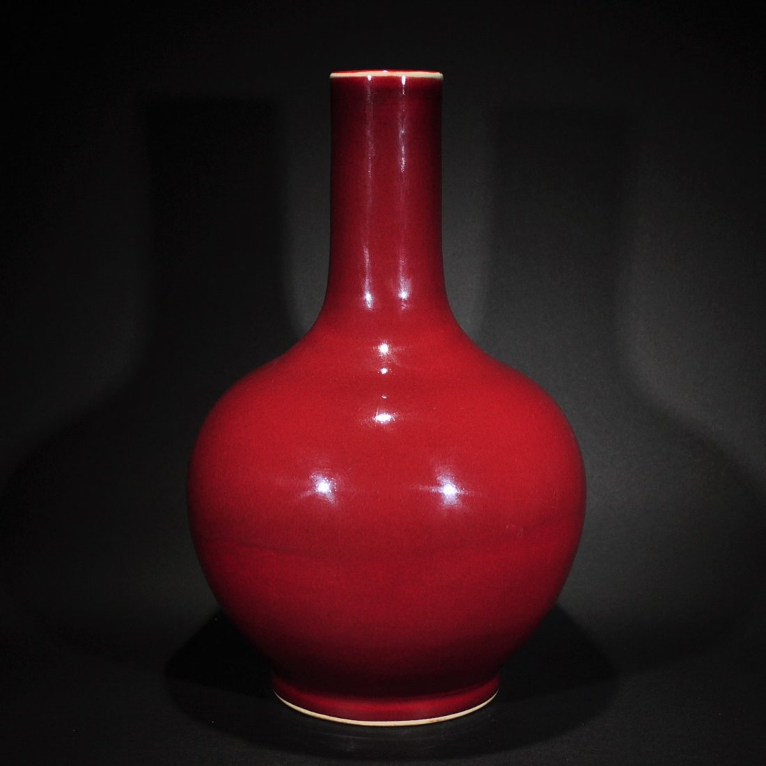 A RED GLAZED GLOBULAR VASE (1 of 7)