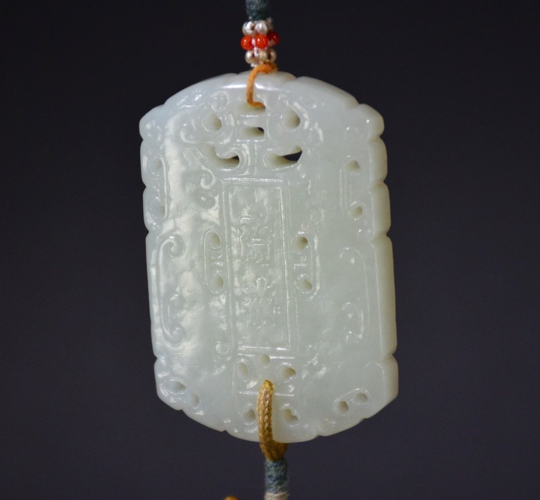 QING D., A CARVED HETIAN JADE PLAQUE (1 of 5)