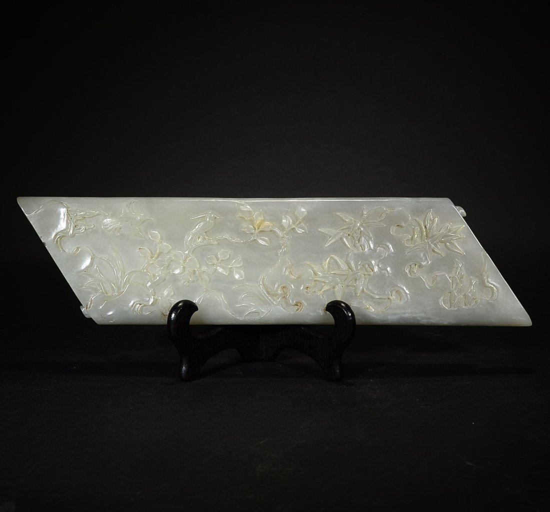 QING D., A WHITE JADE CARVING FLORAL ARM HOLDER (1 of 6)