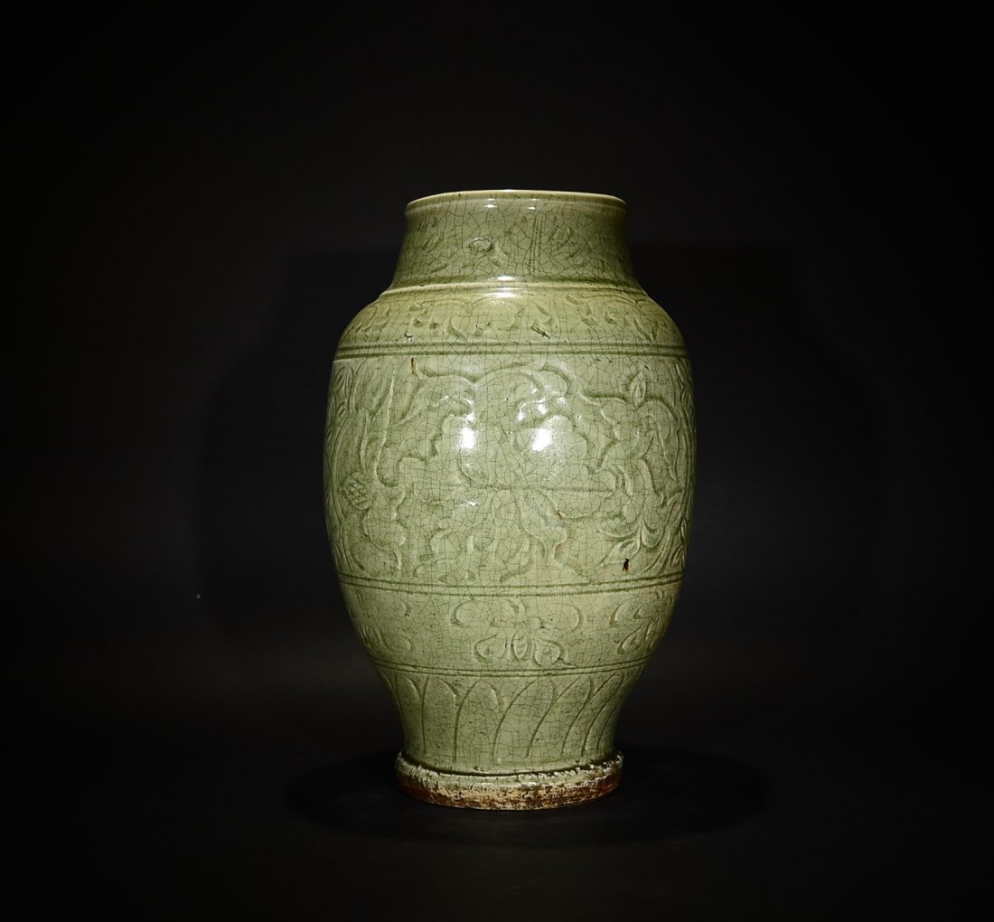 A CARVED LONGQUAN WARE POENY VASE (1 of 8)