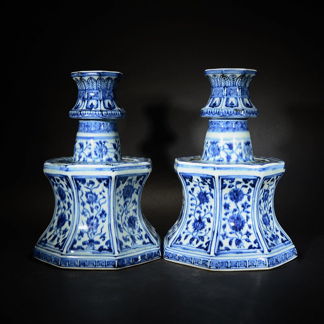 A PAIR OF BLUE AND WHITE CANDLE STANDS (1 of 9)