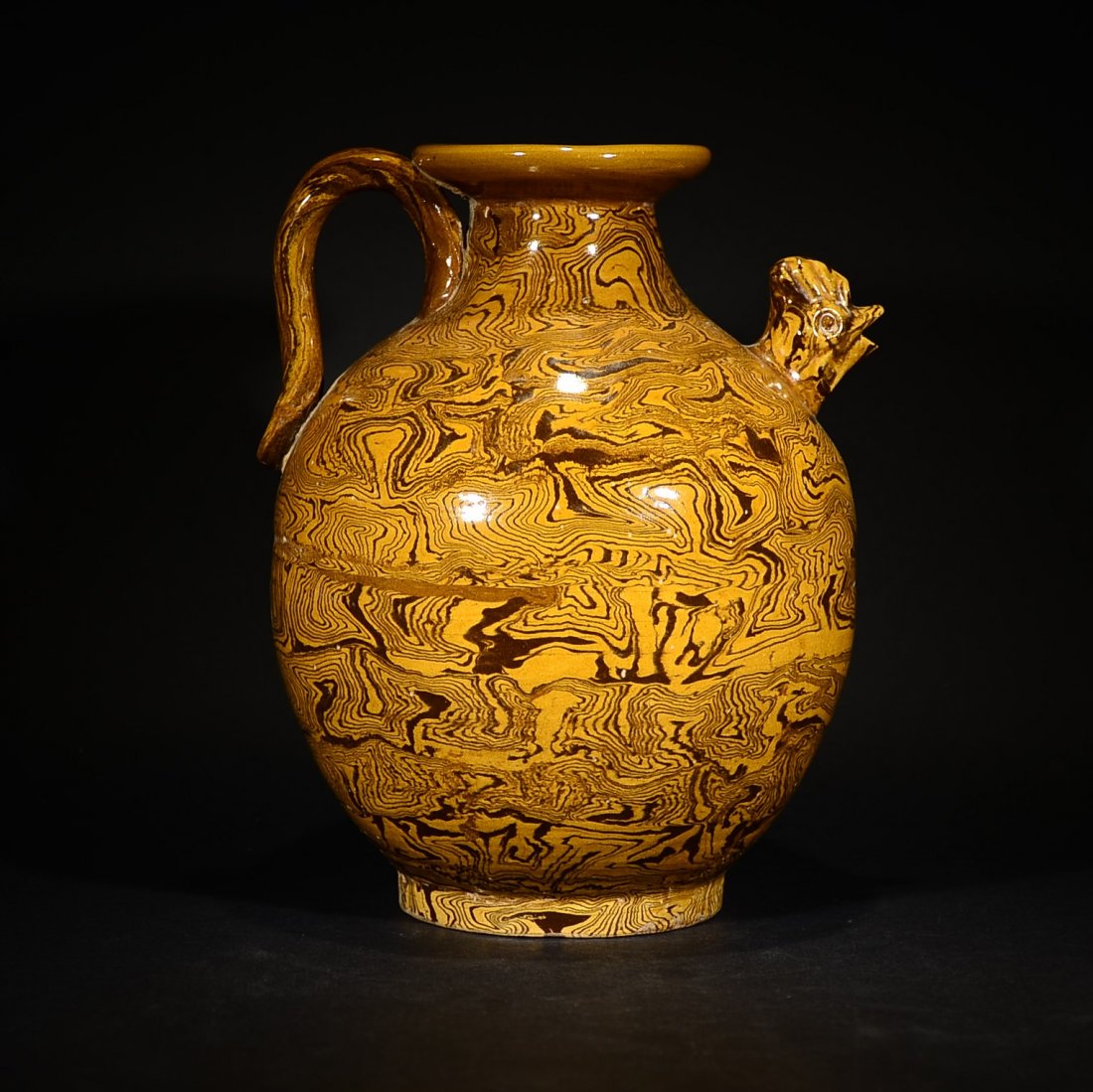 A TWISTED GLAZED PHOENIX PATTERN POT (1 of 9)