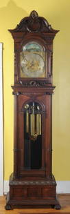 Early Herschede Tall Case Clock: Late 19th / early 20th century, dial marked with etched crown and hammer, no other visible makers marks on dial or on works, Whittington & Westminster chimes, 8 bells and 5 gongs, mahogany, elaboratel