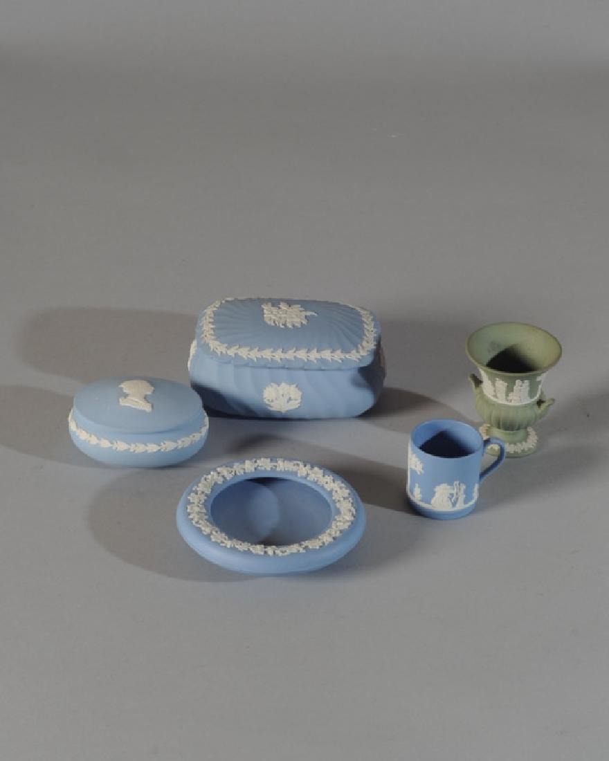 Five Pieces Wedgwood Jasperware: To include green urn with mythological figures, small bowl, two lidded jars (one is for the Golden Jubilee of Queen Elizabeth II), and a small handled mug. Tallest: approx. 3 1/4".