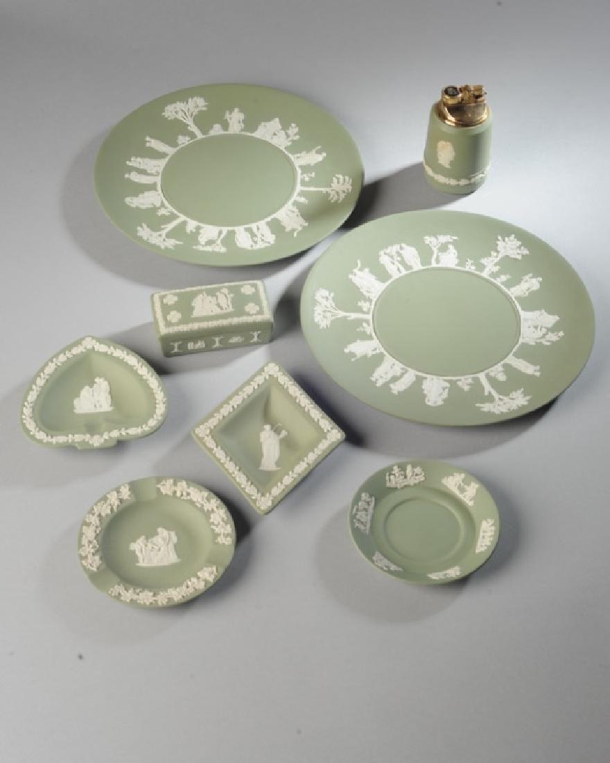 Lot of Green Wedgwood Jasperware: Including two 9 1/2" diameter plates, a lidded box, ashtray, lighter, etc. Tallest: approx. 4".