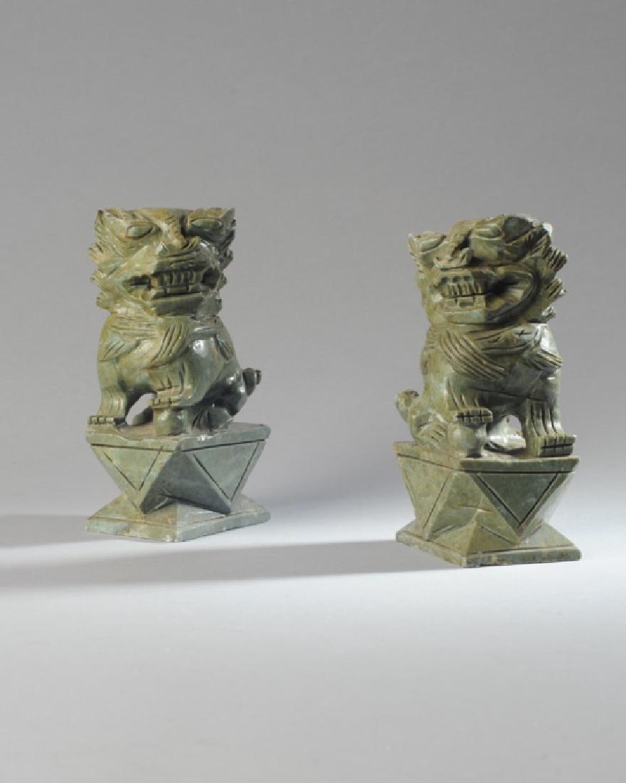 Pair of Asian Soapstone Foo Lions: Minor chipping. H: approx. 6 1/4".