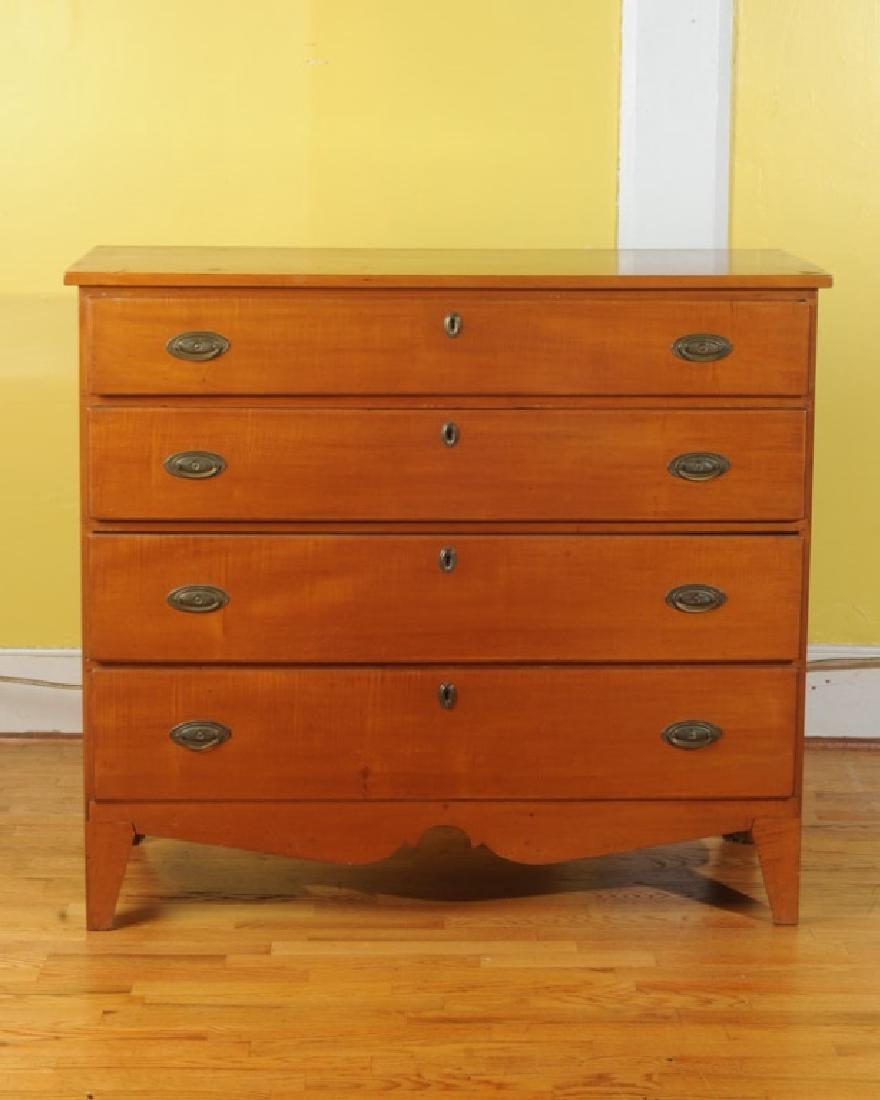 19th C. Hepplewhite Style Dresser: Probably cherry, four graduated drawers over sculptural apron, dovetailed construction. H: approx. 38 1/2". W: approx. 43 1/2". D: approx. 18 3/4".