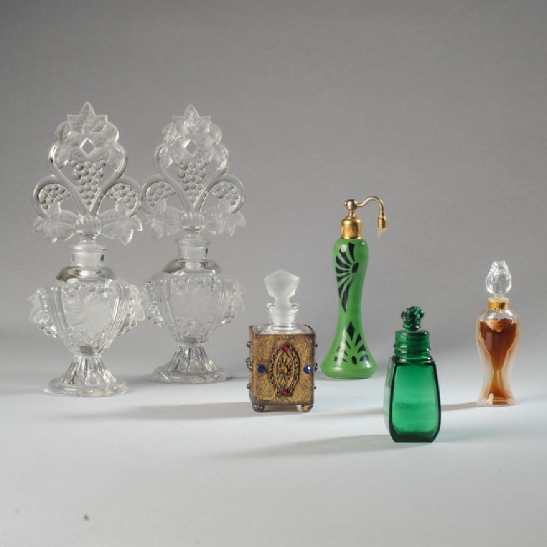 Lot of Perfume and Cologne Bottles: Including matching pair, green Art Deco (missing bulb), Shalimar Guerlain (unopened), etc. Tallest: approx. 9 1/2".