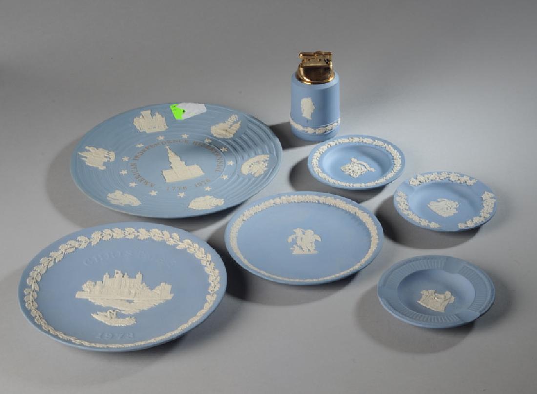 Lot of Blue Wedgwood Jasperware: Including American Independence bicentennial plate, 1973 Christmas plate, ashtrays, a lighter, etc. Tallest: approx. 4".