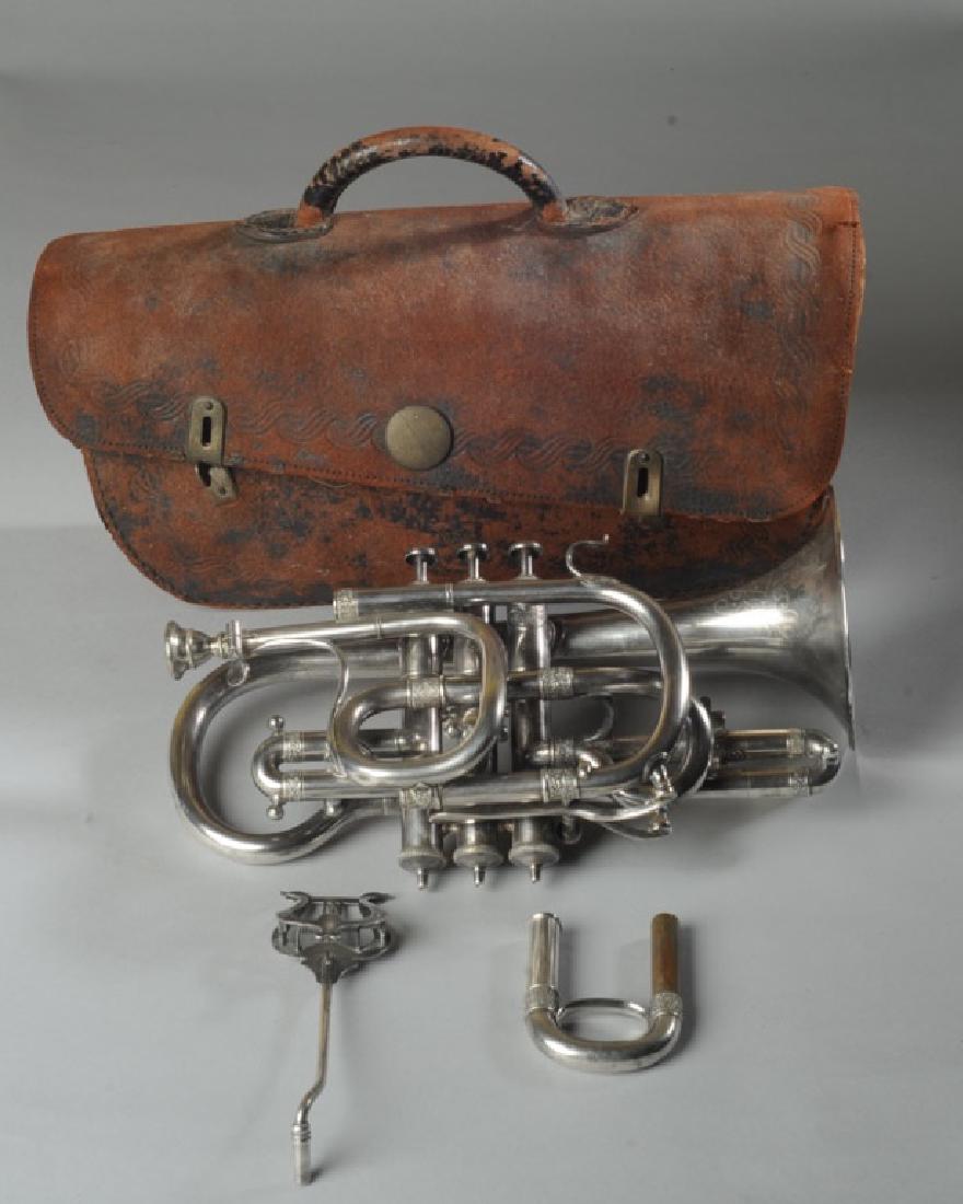 August Pollmann Cornet: Late 19th / early 20th century, vintage cornet in case, inscribed to Bell "August Pollmann Artist New York", good overall condition. L: approx. 12".