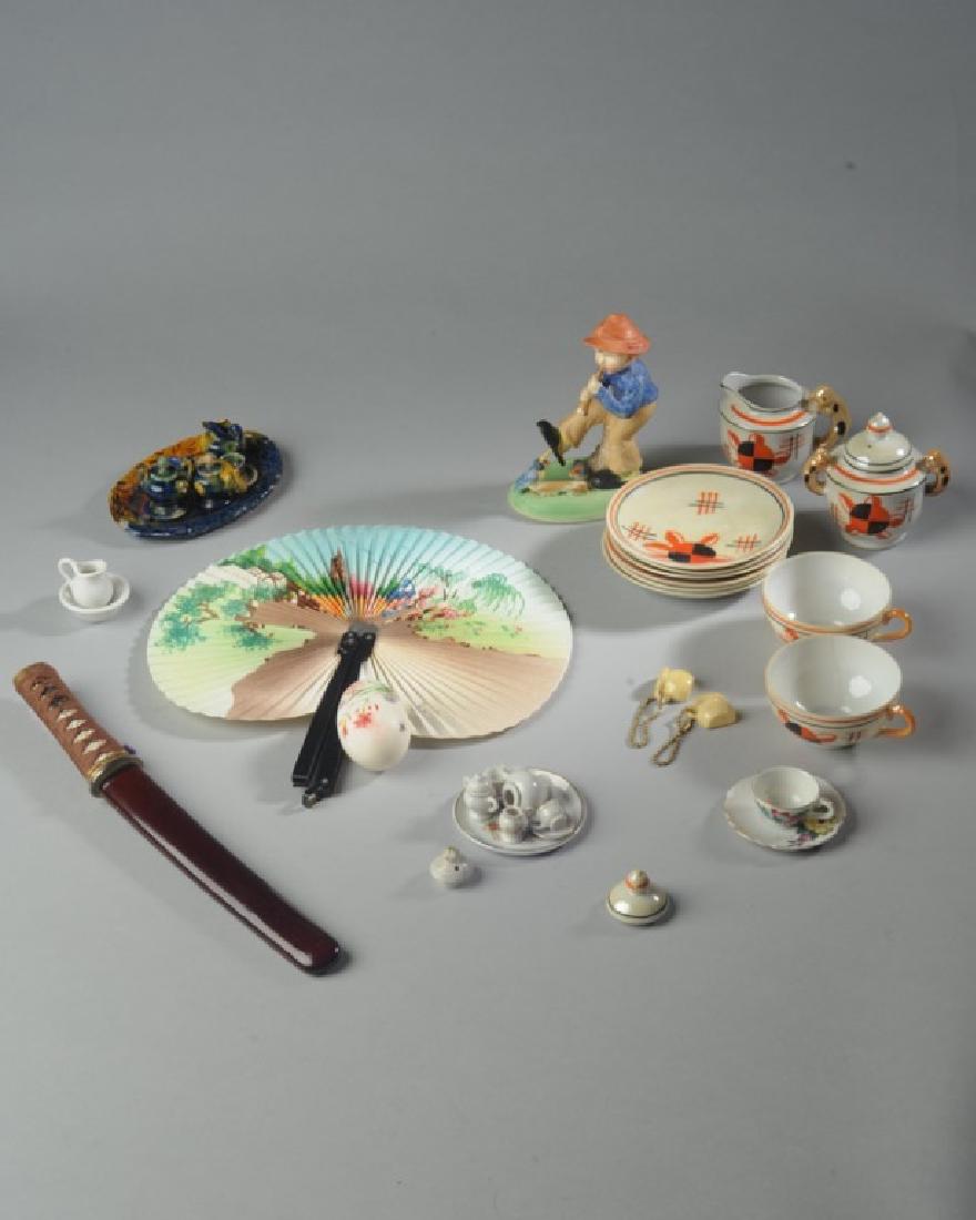 Mixed Lot: To include child's partial lustreware tea set, Japanese doll house tea set, occupied Japan figure, an Asian knife in sheath, etc. Tallest: approx. 5".