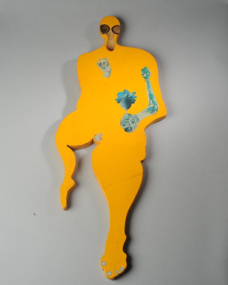 Wooden Sculpture of Alien Figure: Applied decals, illegibly signed and marked 3/78 on reverse. L: approx. 29 1/2".