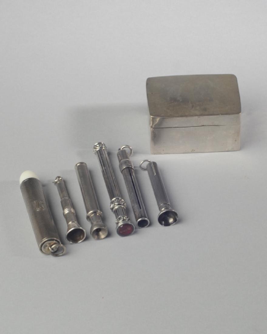 Mixed Silver Lot: Including small box (possibly match holder), wine funnel, sterling diminutive flashlight, cigar punches, and pen holders, assorted plate and sterling. Some pieces hallmarked. Provenance: From a privat