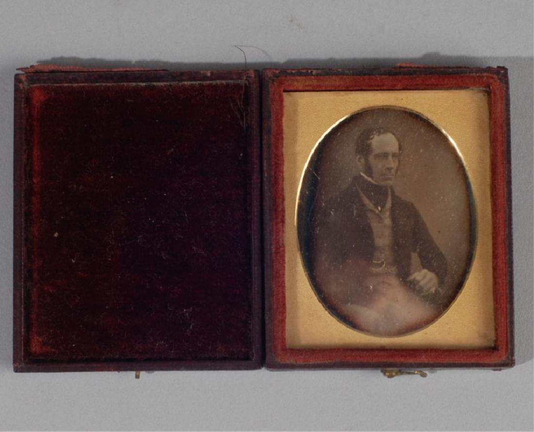 19th C. Daguerreotype of Seated Man: In damaged case. Provenance: From a private Central Virginia collection belonging to the descendants of British Brigadier General Sir William Thomas Francis Horwood. Size: approx. 2" x 1 1/2". Case: a