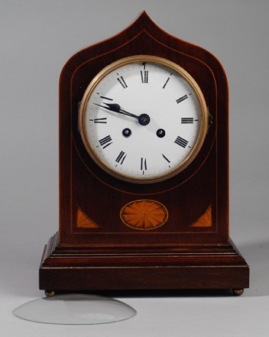 French Mantel Clock: Glass face is unattached, string and shell inlay, one of the clocks given by Mrs. Horwood to family members on her 100th birthday. Provenance: From a private Central Virginia collection belonging to t