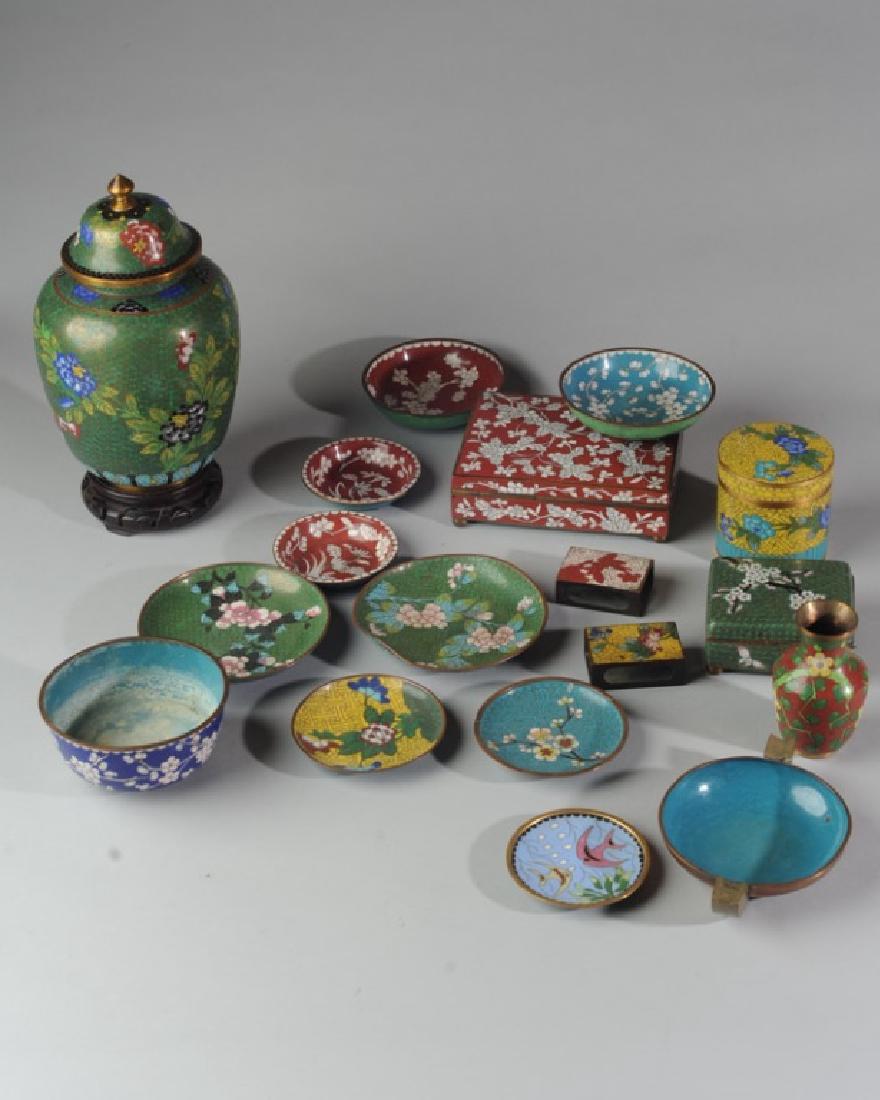 Large Lot Vintage Chinese Cloisonne: Late Qing/ Republic period and vintage items including lidded ginger jar on carved wood stand, five small bowls, five small dishes, three boxes, three matchbox covers, one small vase and one ashtray.