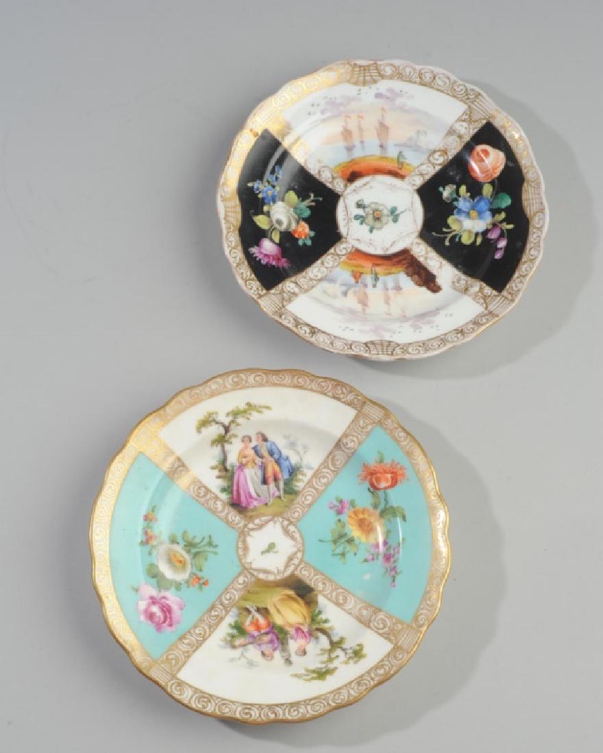 19th C. Meissen and Dresden Plates: One plate with Meissen crossed pommel swords mark, the other in the Meissen style with a 19th century Dresden crown mark. Meissen quatrefoil plate has flowers on black ground interspersed with panels