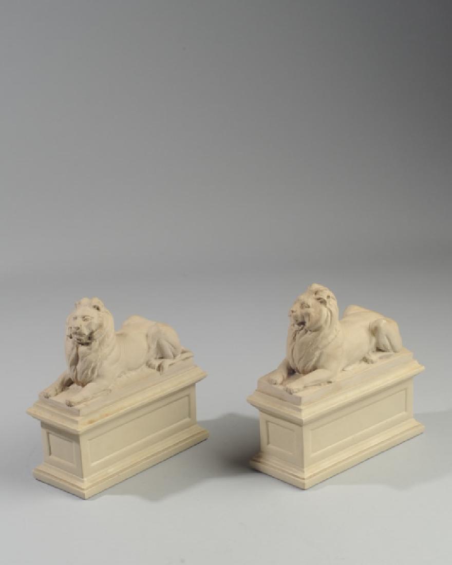 Pair Alva Studios Composition Lion Bookends: Replica of "Patience & Fortitude" by Edward Clark Potter, both marked AMR 1965, chip to base of one. H: approx. 6 3/4".