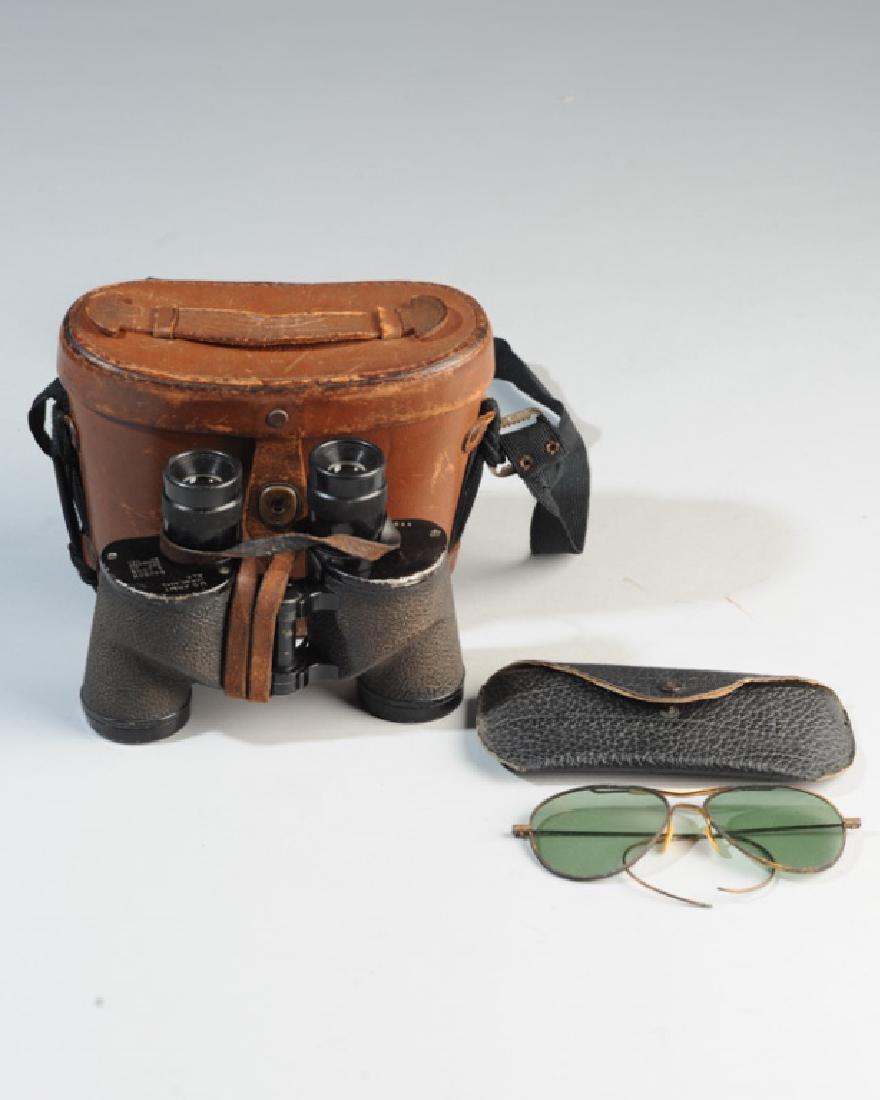 WW2 Binoculars w/ Case, Early Aviator Sunglasses: WW2 era aviator sunglasses with slightly curved lenses, curved ear pieces, iin original case. Offered together with WW2 Bauch & Lomb 6 X 30 Army Binoculars. Original leather case shows wear, strap rep