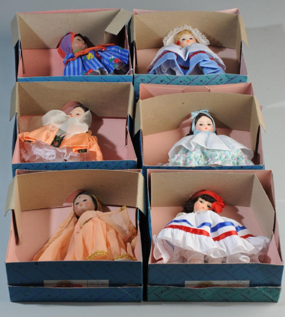 Six Madame Alexander Dolls in Original Boxes: Including Jamaica 542, Crete 529, Dominican Republic 544, Argentine 571, India 549, and Netherlands 591. Size of Box: approx. 8 1/4" x 8 1/2" x 3 1/2".