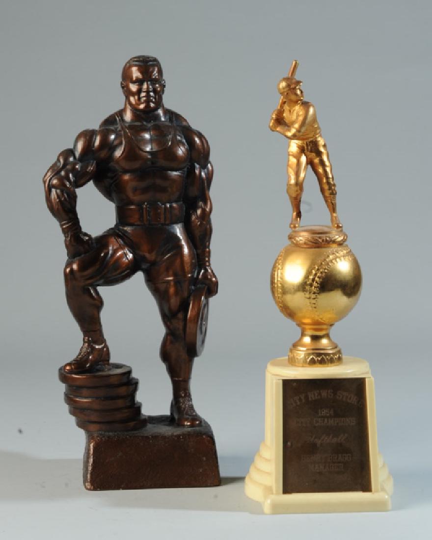 Softball Trophy and Niels Anderson Figure: "City News Store 1954 Champions Softball Henry Bragg Manager", and weight lifter sculpture. Tallest: approx. 13 1/2".