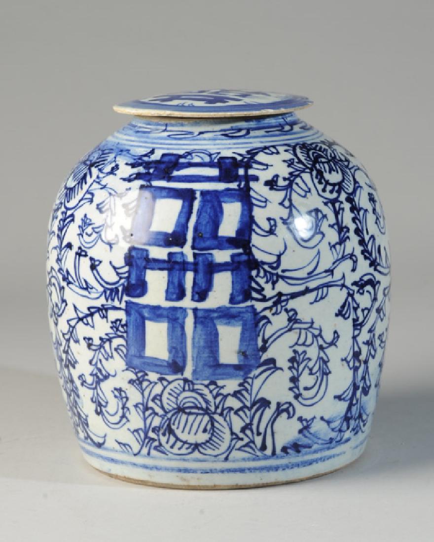 Chinese Blue & White Double Happiness Ginger Jar: With an allover pattern of loosely painted scrolling sweet pea, and "Double Happiness" symbol on front and back and on cover, key design at rim and simple double line border at base. Unmarked. Small c