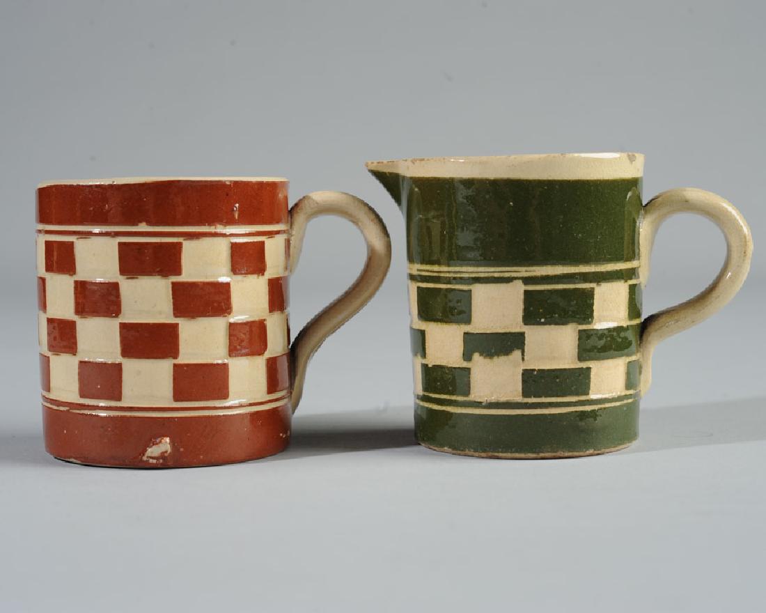Two Pieces Checkerboard Yelloware: Creamer and mug. Tallest: approx. 3".