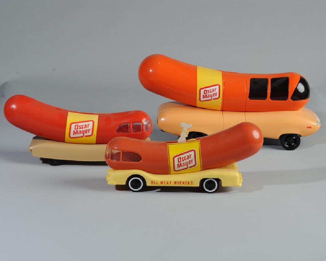 Three Oscar Mayer Weiner Mobiles: One with figure and "All Meat Weiners". Longest: approx. 13".