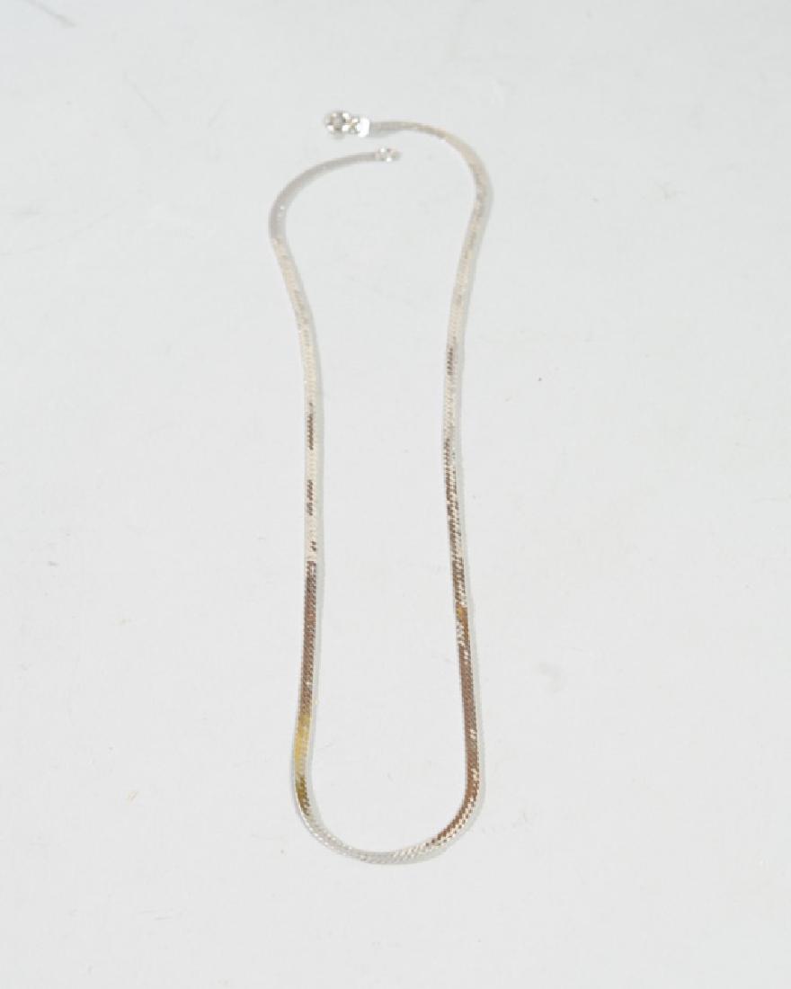 14K White Gold Flat Chain Necklace, Italy: Marked "14 K, Italy" with "B" maker's mark. Approx. 6 grams, .192 ozt. 17 1/2" in length. From the estate of Curtis E. Hagwood of Portsmouth, Virginia.