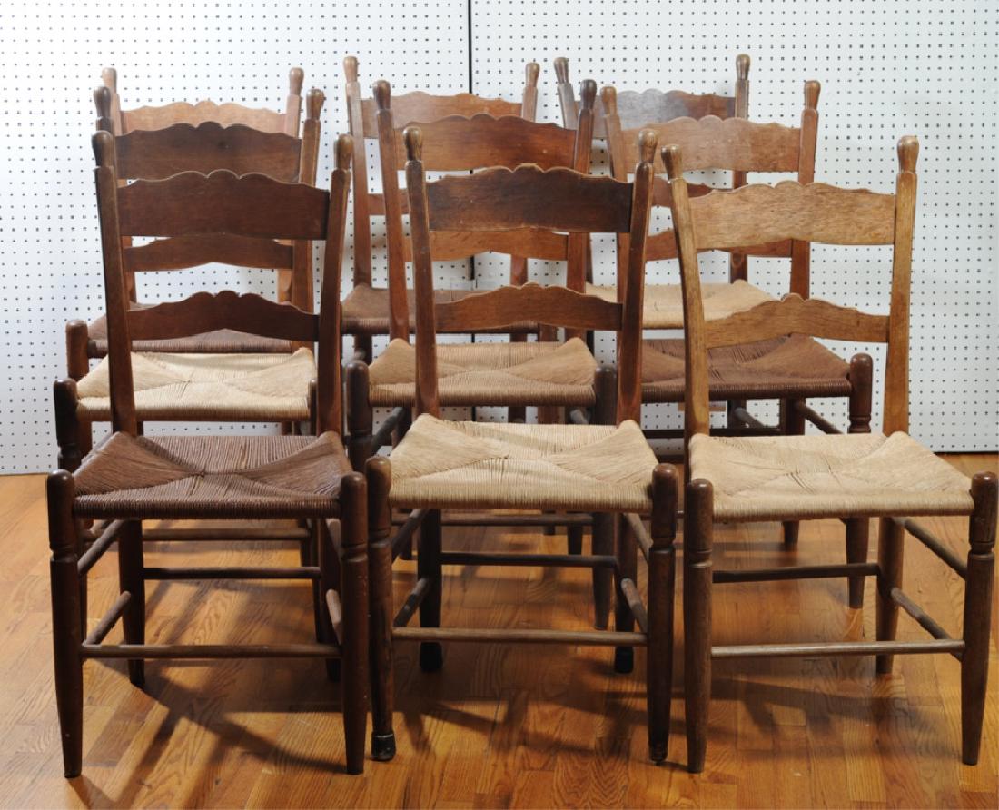9 Antique Clore Rush Seat Dining "Fancy" Chairs: From an old Madison, Virginia farm house that had been in the same family for four generations, nine E. A. Clore oak "fancy" dining chairs, including one arm chair, from the renown local furniture mak