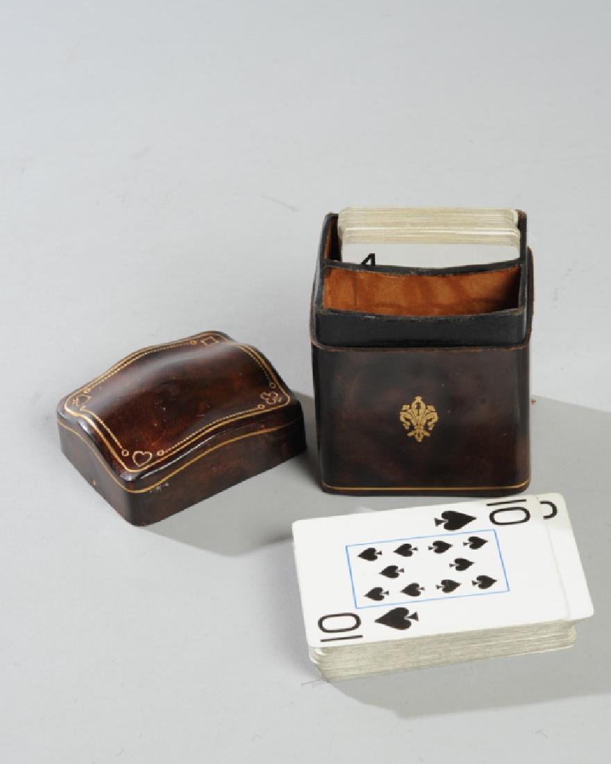 Vintage Italian Leather Playing Card Case & Cards: Gold embossed, marked "Genuine Leather Made in Italy", two decks of playing cards included. From the estate of Curtis E. Hagwood of Portsmouth, Virginia.