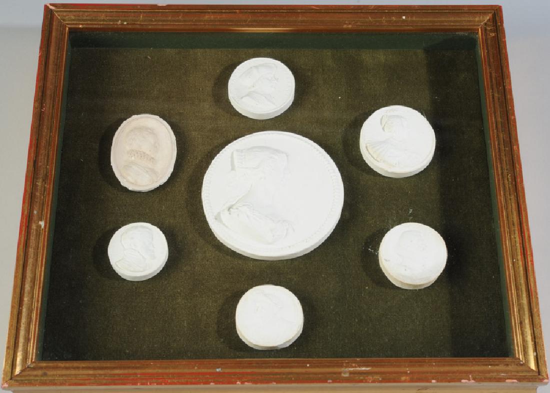 Seven Plaster Cast Medallions (1 of 3)