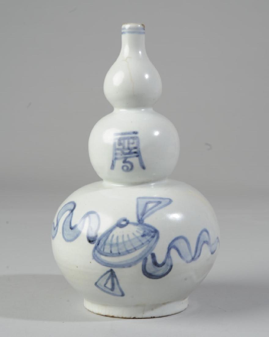 Rare Korean Triple Gourd Form Blue & White Vase: Calligraphy and banner, light crazing and hairlines. H: approx. 9 1/2".