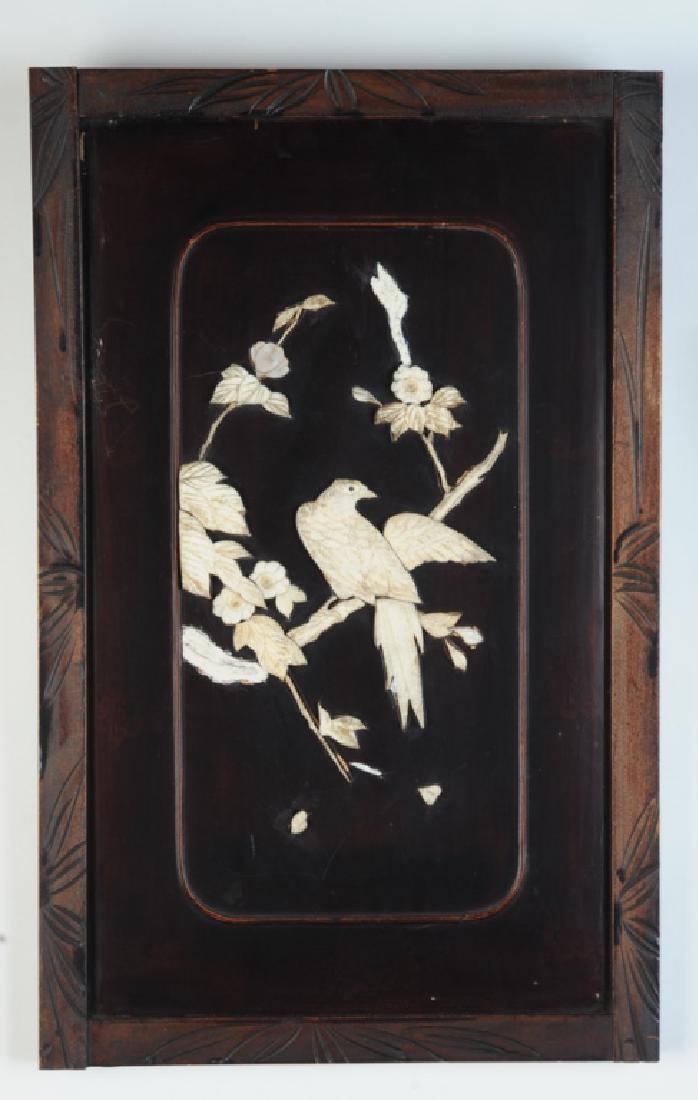 Pair Japanese Inlaid Bone Wood & Lacquer Panels: Pair of Japanese hanging panels with carved wooden frames surrounding black lacquer with birds on flowering branches in inlaid bone. Meiji period. Some loss of inlay on one panel. Each approx. 12 1/4"
