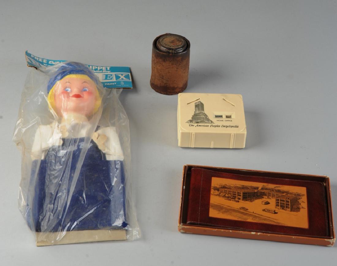Advertising Lot: Dutch Boy puppet in original wrapper, The American Peoples Encyclopedia Bank, Bromo-Seltzer leather cups, Lance leather wallet?