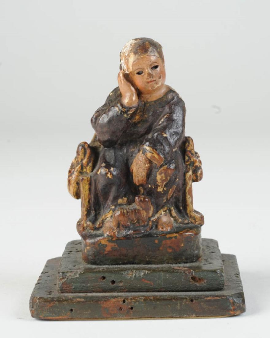 Spanish Colonial Santo St. Roch with Dog: Miniature 18th or 19th C. santo shows St. Roch, seated on a chair, his pilgrims' gourd and sack hanging from the chair's arms, his head resting on his hand, a small dog at his feet. St. Roch lived fro
