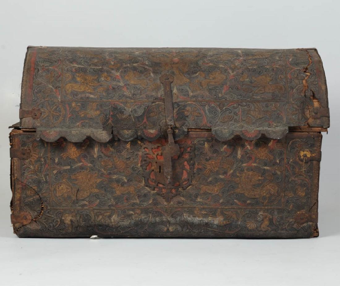 Spanish Colonial Embossed Polychrome Leather Chest: Incredible 18th century Spanish colonial leather-covered trunk is lavishly embossed with lions, birds, double-headed eagles, rabbits, scrolling flowers and arabesques. Much original polychrome and gil