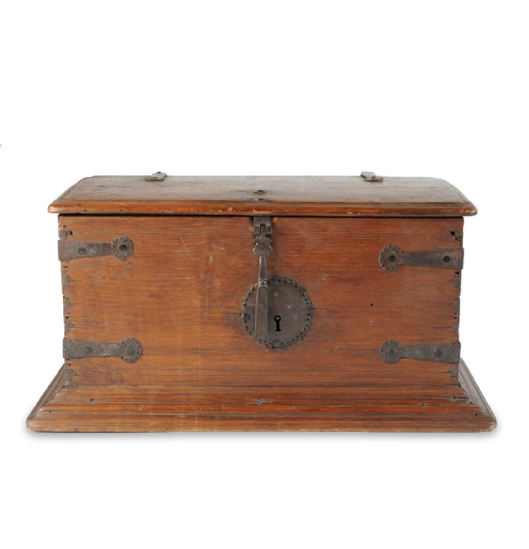 17th C. Spanish Iron-Mounted Walnut Trunk: With decorative iron straps and key plate, hinged lid opens to storage area with small side-mounted compartment, all four feet are detached and one is missing. H: approx. 12 1/4" without feet. W: appr