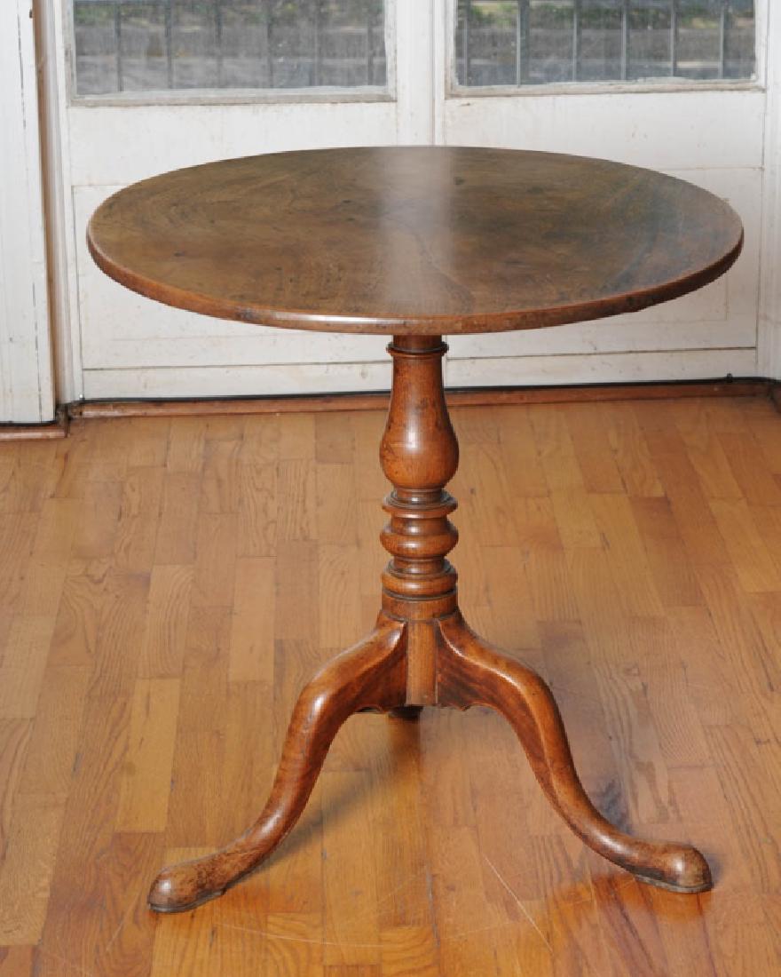 Antique Queen Anne Style Tilt Top Tea Table: Round tilt top over baluster turned standard over three cabriole legs with pad feet. Dia: approx. 27". H: approx. 27".