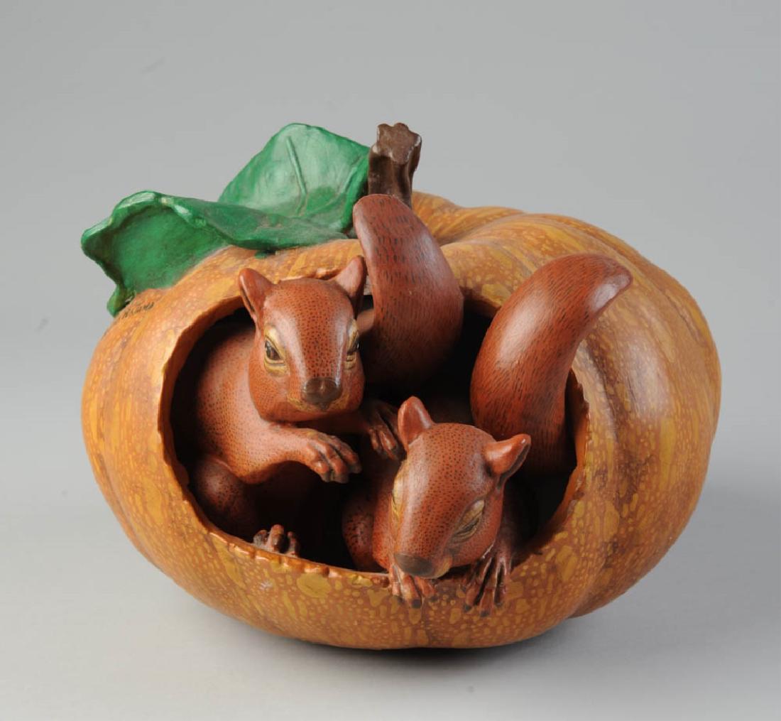 Sergio Bustamante Ceramic Sculpture: Squirrels in a pumpkin. Bustamante is a Mexican artist born in 1942. Signed. Some chipping to base. H: approx. 6 1/2".