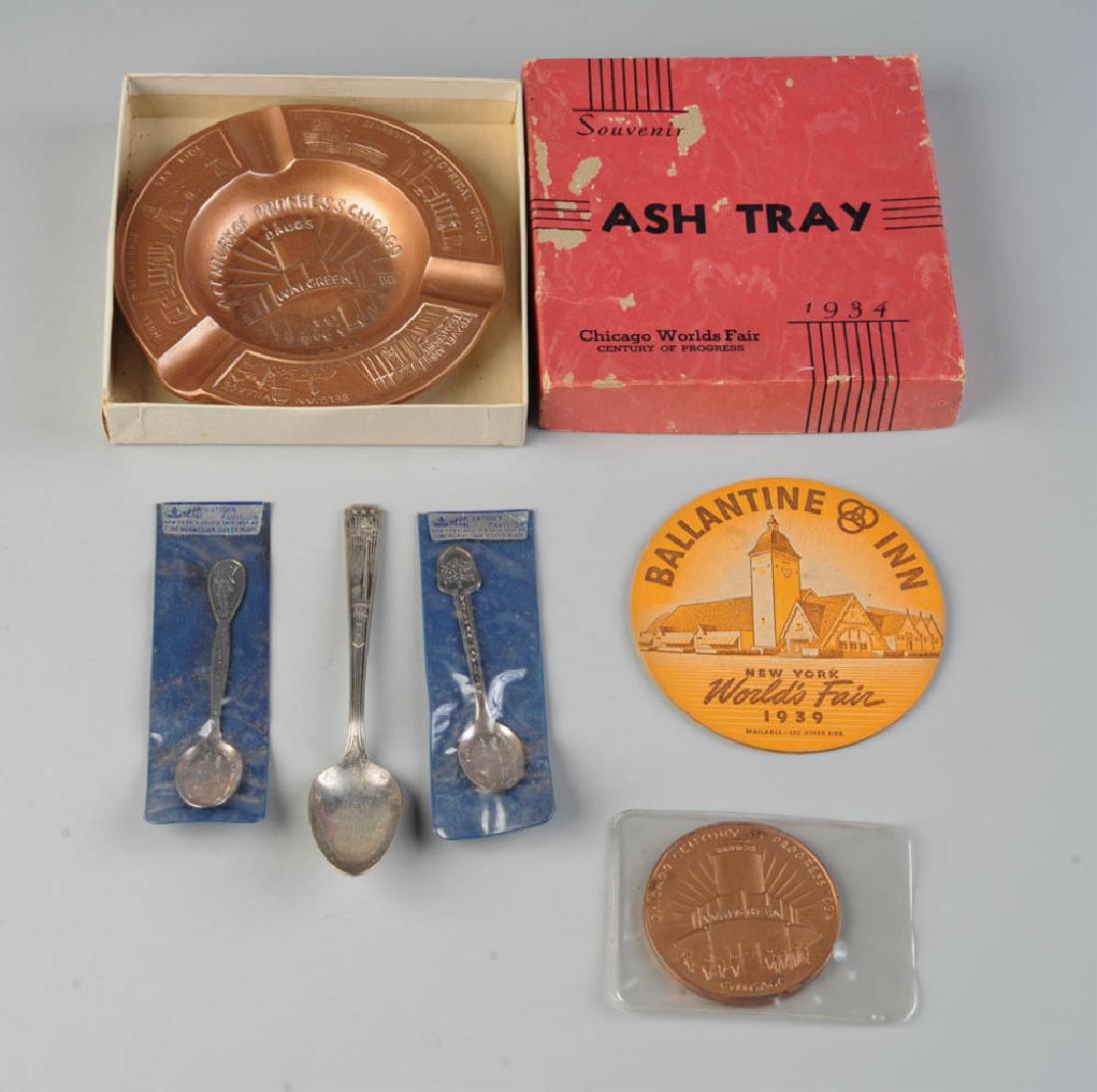 World's Fair Lot: Walgreen 1934 Century of Progress ashtray in original box (damage to box) together with a matching paperweight, World's Fair spoons, etc.
