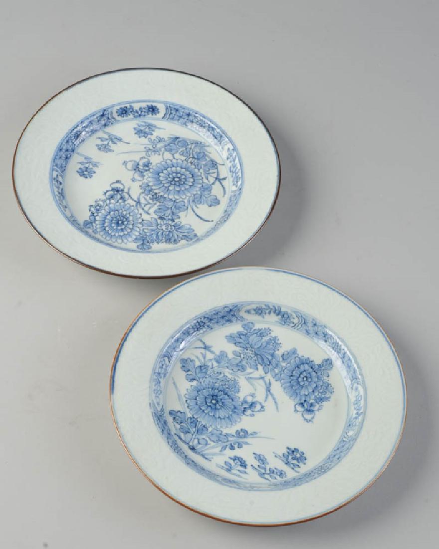 Pair Chinese Blue & White Export Porcelain Plates: 19th century, minor chips to the foot rims, and one shows a faint hairline. Dia: approx. 9".