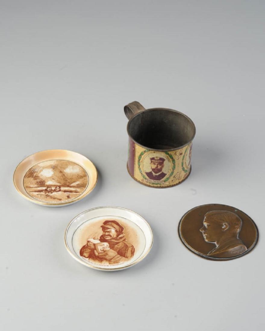 English Royalty & WWI Lot: King George V tin mug, Edward VIII Cameograph, Staffordshire WWI saucer "Well, if you knows a better 'ole, go to it", on verso: "Made by the girls of Staffordshire during the winter of 1917 when the b