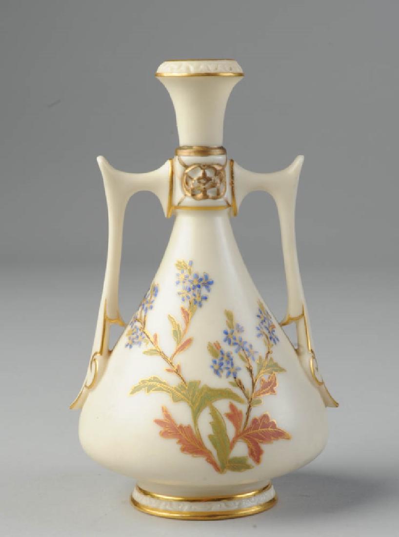 Royal Worcester Diminutive Double Handled Vase: With gilt and floral decorations, marked to base with Rd. No. 5434 and 1021. No visible chips, cracks or repairs. H: approx. 5 1/2".