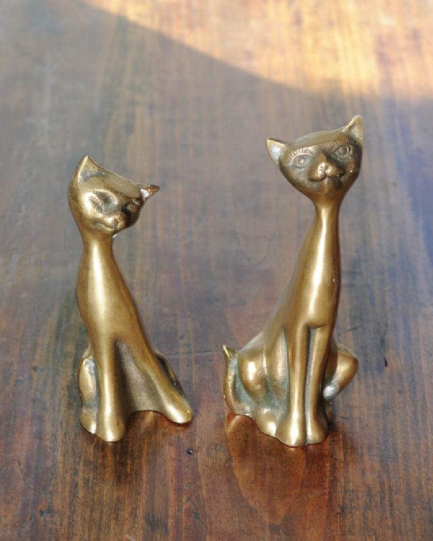 Pair Vintage Brass Cats: With heads cocked quizzically, as if to wonder if you'll bid on them. No visible maker's marks. Tallest: approx. 7 1/4".