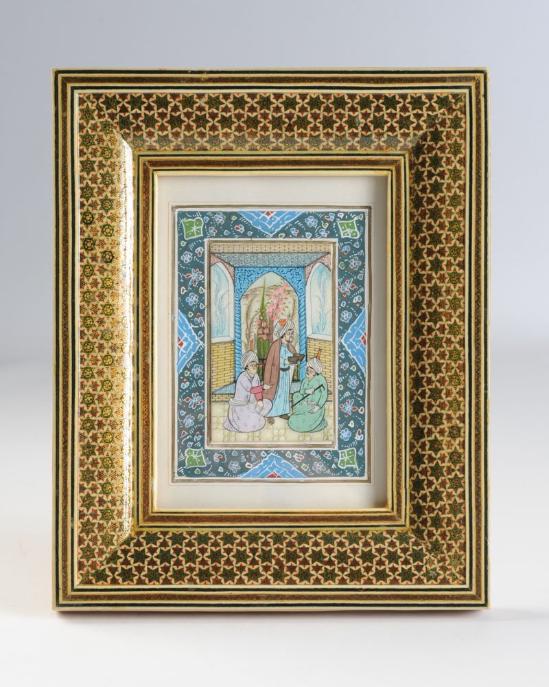 Miniature Persian Painting on Bone: Showing three gentlemen in an tiled interior with a view of a garden and mountains. Housed in an inlaid Khatam frame. Frame, approx. 8 1/2' x 10 1/2". Image approx. 4" x 5 1/2".