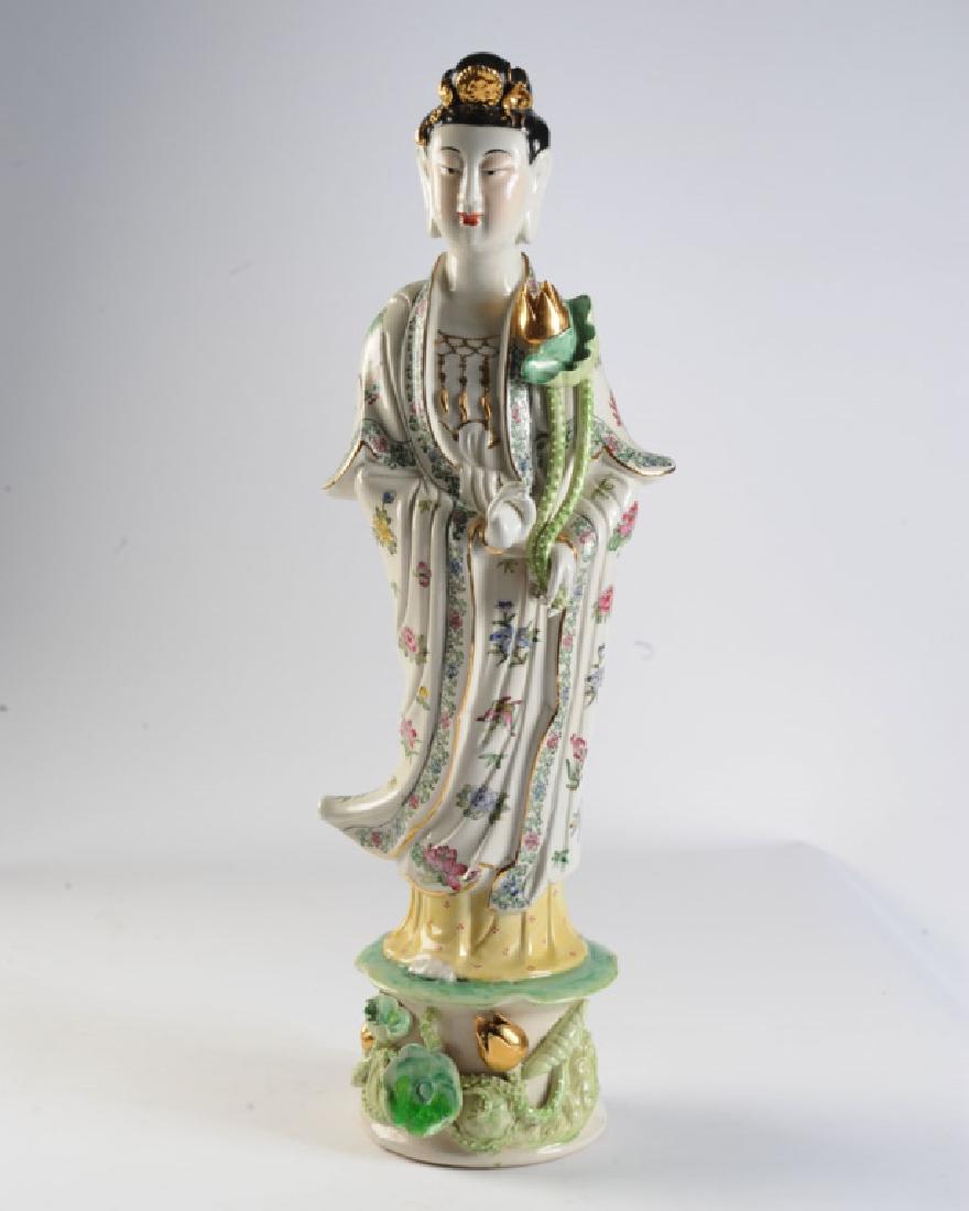 Vintage Famille Rose Porcelain Guanyin Figure 26": Figure of Guanyin, the Chinese goddess of Compassion, also Kwan Yin, stands on lotus platform holding lotus blossom. Famille rose and gilt enamels on white ground. Relief mark to base with triangular 
