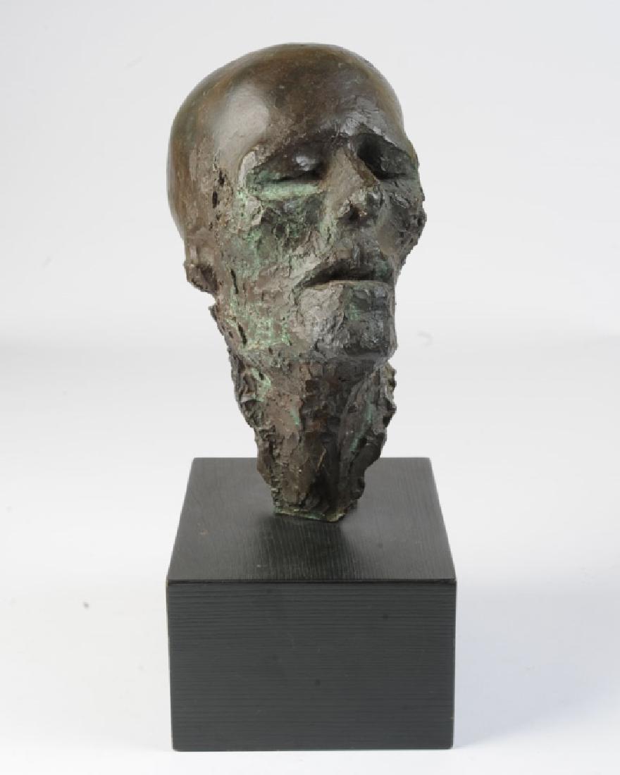 Elliot Offner (1931-2010) Bronze Head: Entitled "Holocaust Head", by Massachusetts sculptor Elliot Offner. Signed "Offner". The artist received both a B.F.A. and M.F.A. from Yale University, and was the Andrew W. Mellon Professor of Humani